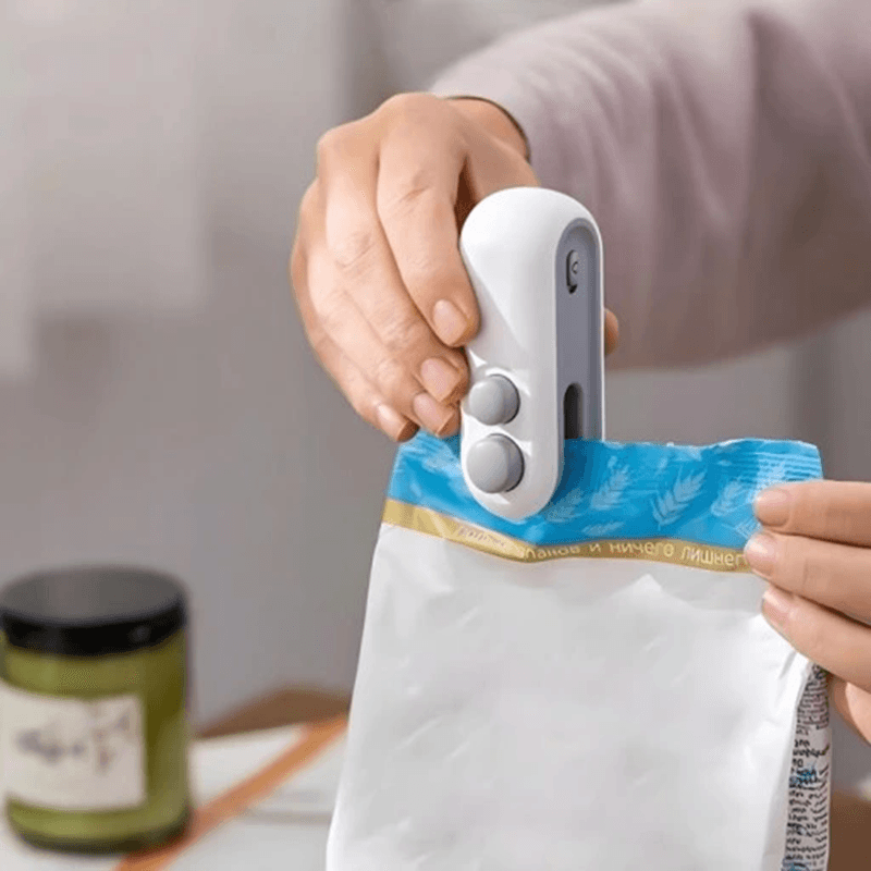 Elektryczna mini zgrzewarka 2w1 z otwieraczem do folii/ opakowań – bezprzewodowa, magnetyczna, USB-C